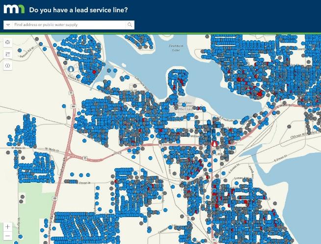 A digital map displays numerous blue and some red dots representing data points for lead service lines in a specific geographic area.