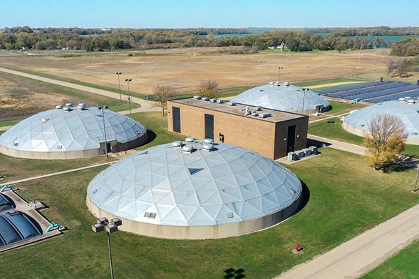 4 wastewater treatment domes in the field